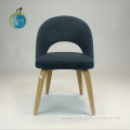 Upholstered chair with wood legs cafe dining style